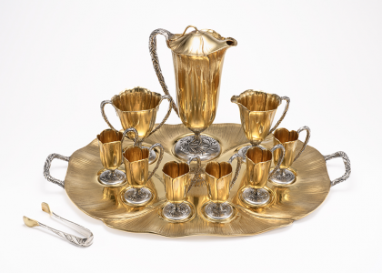 Chocolate set and cup, 1915, made by Gorham Manufacturing Company, Providence, Rhode Island, gilded silver, Lenox porcelain liner. Winterthur Museum, 2023.0003.001-.011. Chocolate set and cup, 1915, made by Gorham Manufacturing Company
